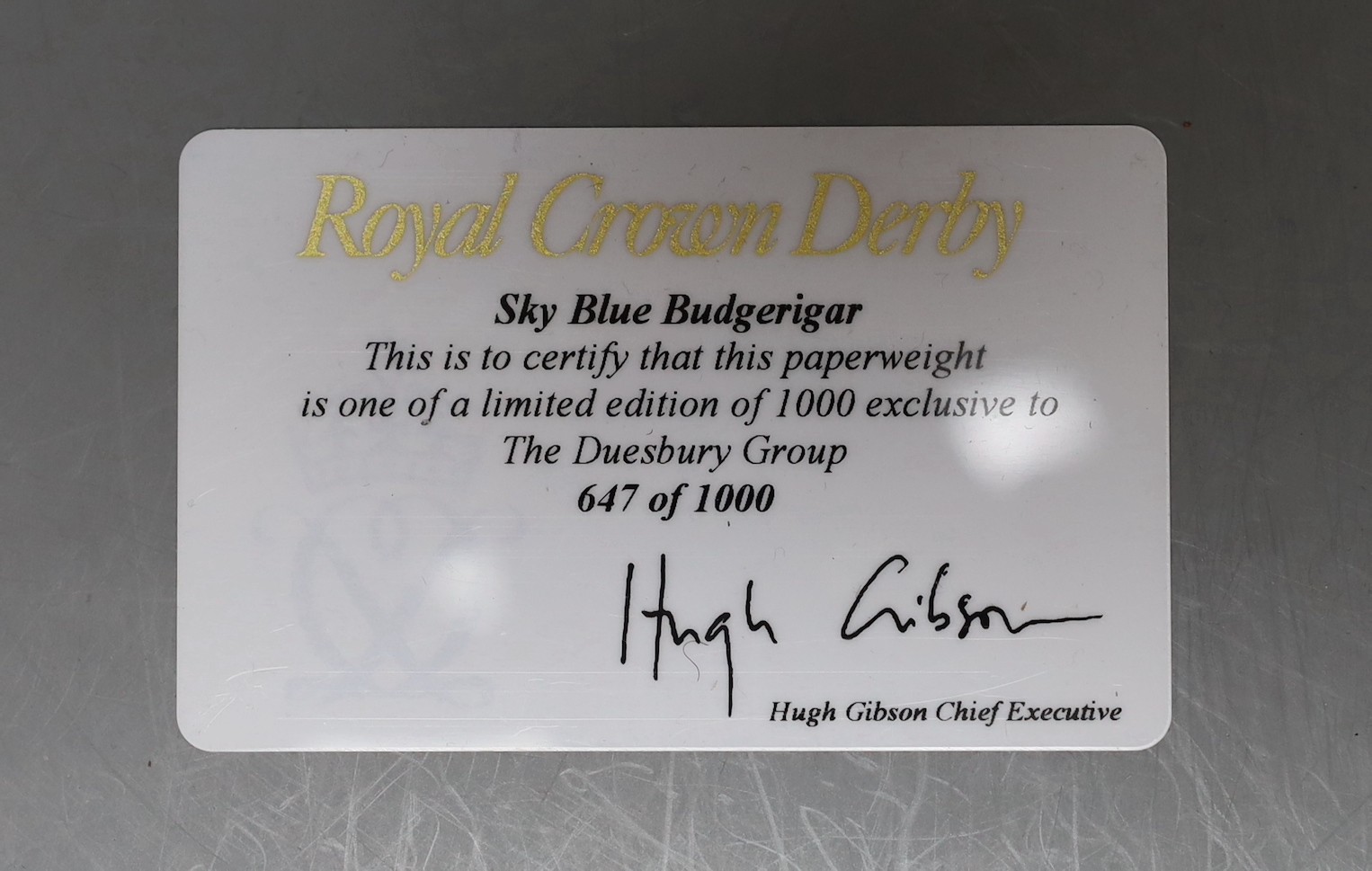 A limited edition Royal Crown Derby paperweight - Sky Blue Budgerigar, gold stopper, boxed with edition card, 647/1000
